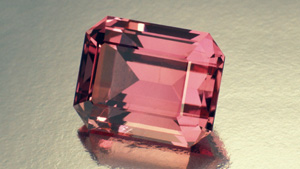 This 10.15-carat purplish pink topaz has no eye visible inclusions. - Courtesy The Natural History Museum of L.A.