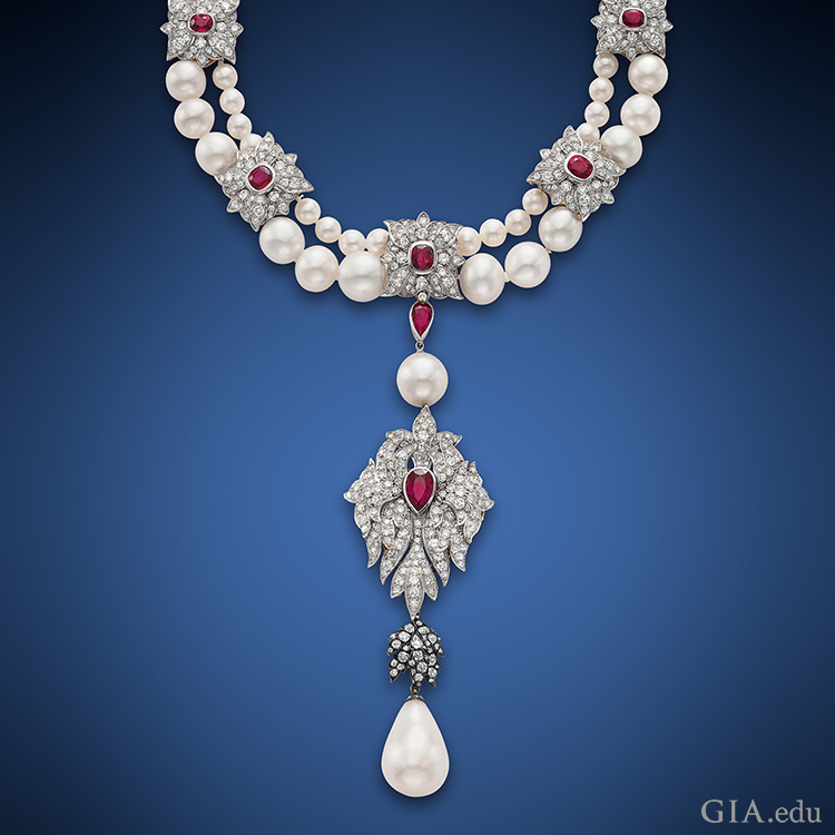 Elizabeth Taylor’s historic 50.56 carat La Peregrina Pearl prominently features the June birthstone in a pendant to a two-strand pearl, ruby, and diamond necklace. 