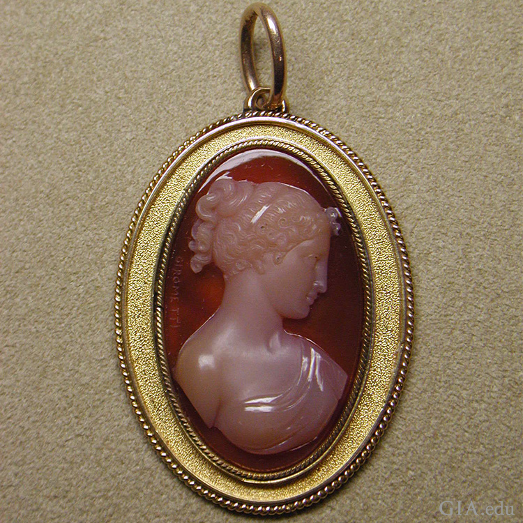 The August birthstone is displayed in an early 19th century Italian sardonyx cameo mounted in gold as a pendant.