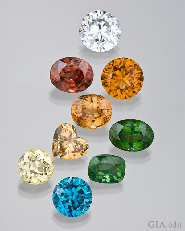 The December birthstone zircon is displayed in an array of colors of blue, green, yellow, orange, red, and clear.