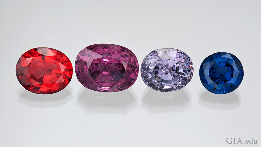 An array of red, violet, and dark blue spinel showcase the many colors of the August birthstone.