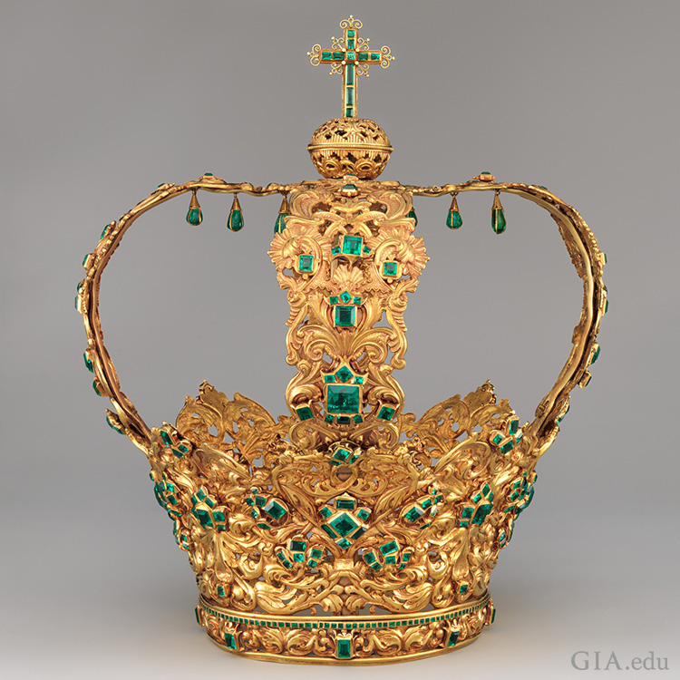 The Crown of the Andes boasts the May birthstone with a 24 carat emerald center stone and 442 additional emeralds set in the intricately crafted golden headpiece.
